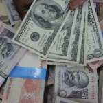 Rupee closes below 60 against dollar
